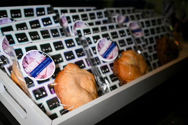 Closeup of gourmet cookies branded with the baker, Bernice, as well as a Houston insert.